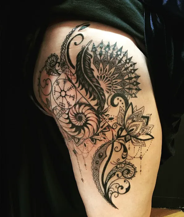 Metamorphosis Tattoo LLC 0