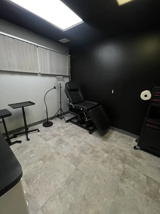 Ink and Needles Tattoo Studio 0
