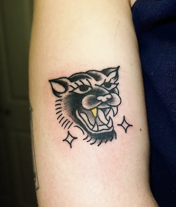 Gold Tooth Tattoo Company 0