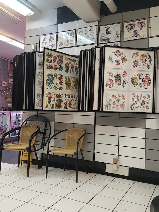 Pelican Tattoo & Body Piercing 7