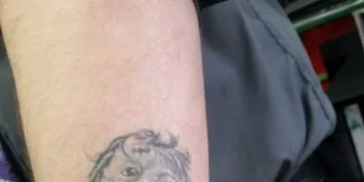 Evolution Tattoo