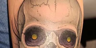 grim tattoo