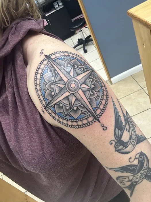 Revelation Tattoo and Piercing 0