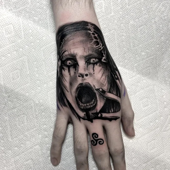 Evol Tattoo 9