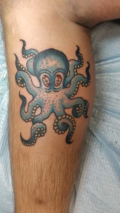 Slingin' Ink Tattoo 0