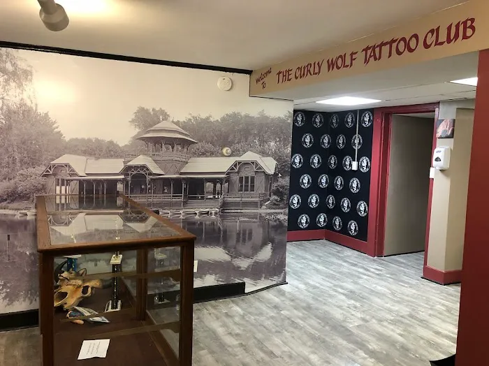 The Curly Wolf Tattoo Club 9