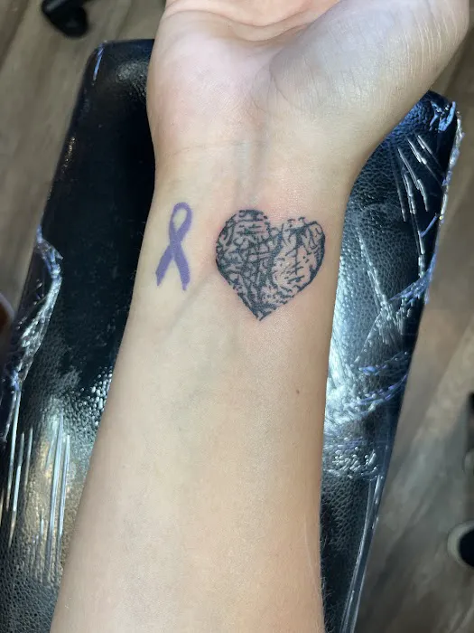 Gallery Thirty Two & Tattoo Company LLC 1