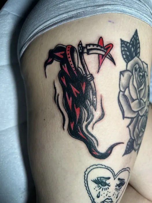 Scarlet Rose Tattoo 7
