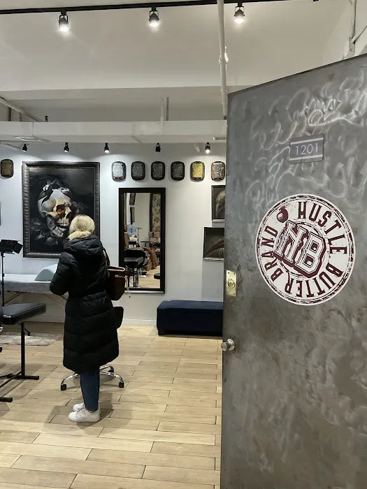 Hustlers Parlour Tattoo and Piercing 1