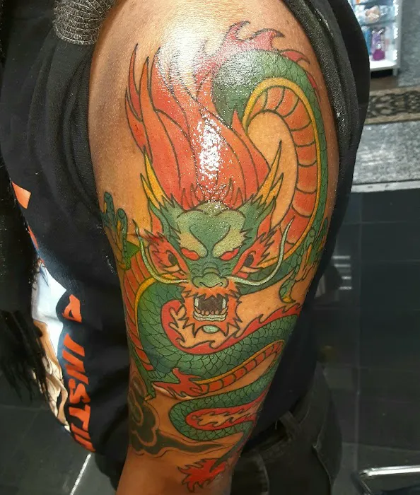 Village Moon Tattoo & Body Piercing 2