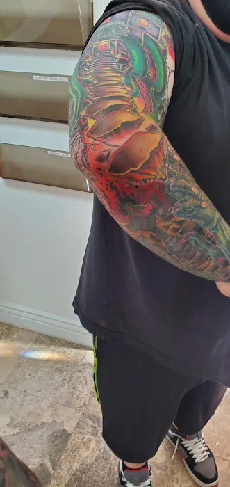 Art In Motion Tattoo Studio 0