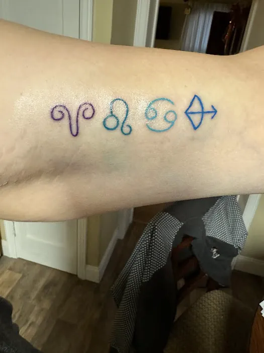 Ken's tattoo and body piercing 6