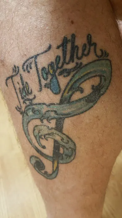 White Lotus Tattoos on 9LLC 7