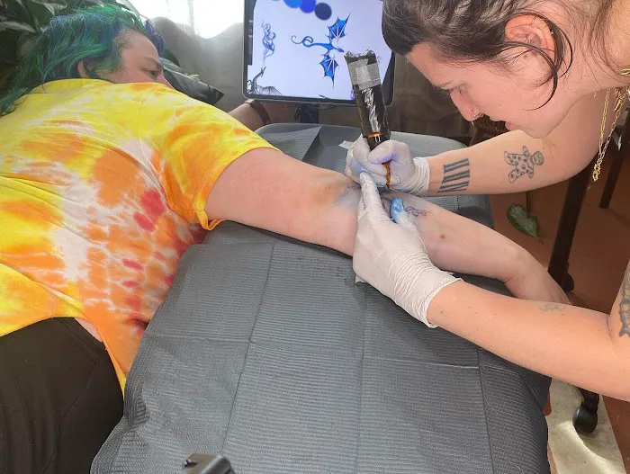 Tiny Bone Tattoo 2