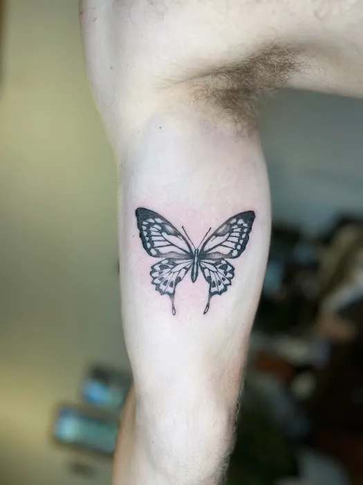 Tiny Bone Tattoo 5
