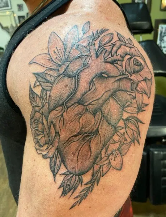 black dot tattoo 1