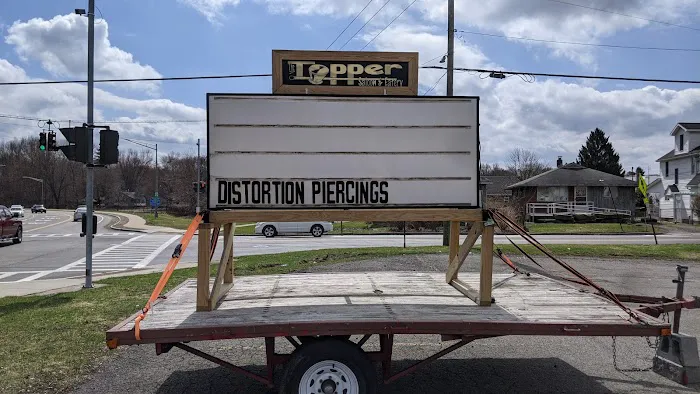 Distortion Piercings & Polish 0