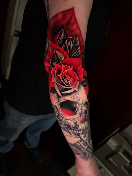 Red Raven Tattoo and Body Piercing 0