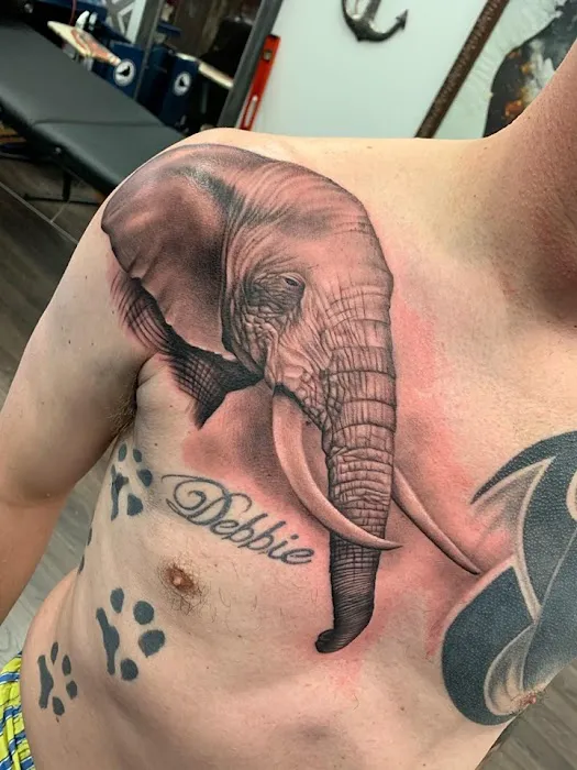 Red Raven Tattoo and Body Piercing 7