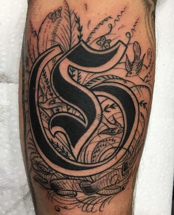 Tommy Houlihan's Miraculous Medal Tattoo 0