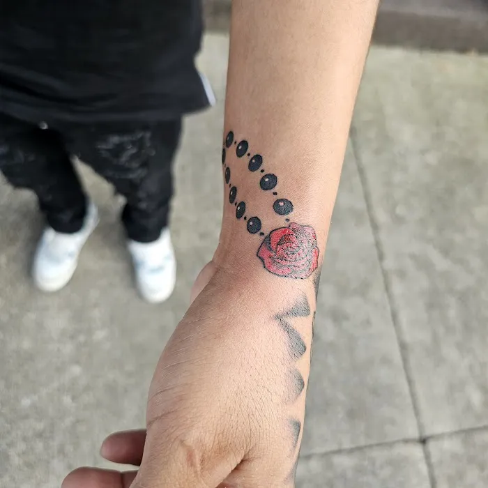 Tommy Houlihan's Miraculous Medal Tattoo 9