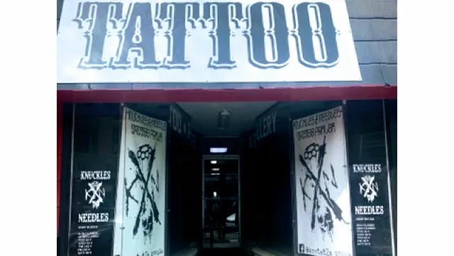 Knuckles & Needles Tattoo Parlor 9