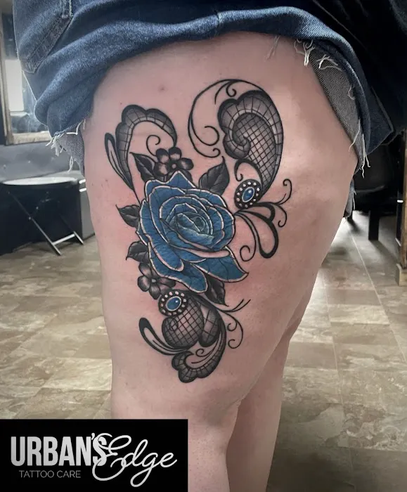 Knuckles & Needles Tattoo Parlor 1