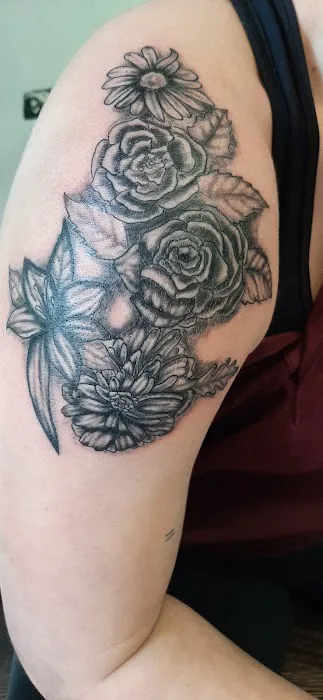 Axonic Inkworks Custom Tattoo Studio 0