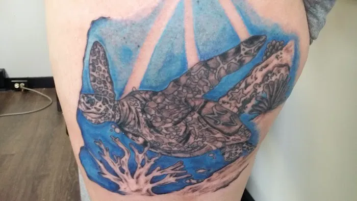 Axonic Inkworks Custom Tattoo Studio 1
