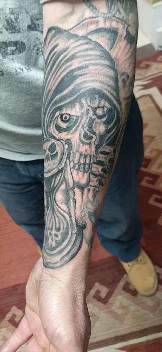 Axonic Inkworks Custom Tattoo Studio 6