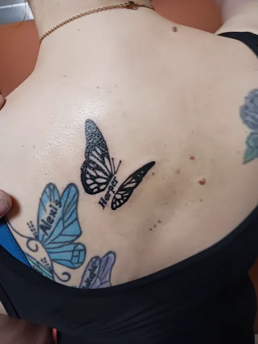 Draconis Ink and Piercings 7