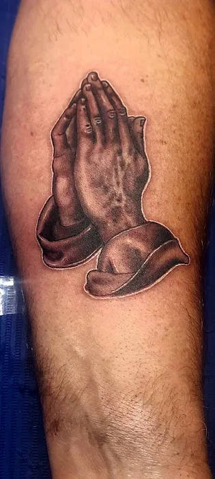 Liberty Bell Tattoo and Piercing 0