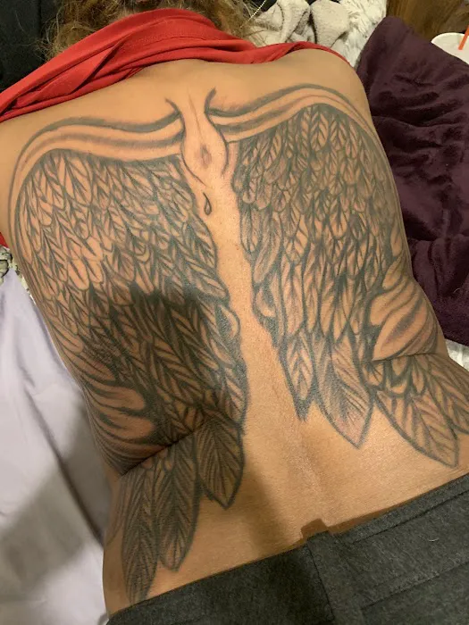 Twisted Tattoo And Piercings 9