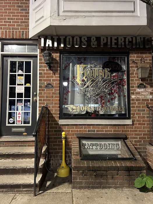Floating World Tattoos and Body Piercing 8
