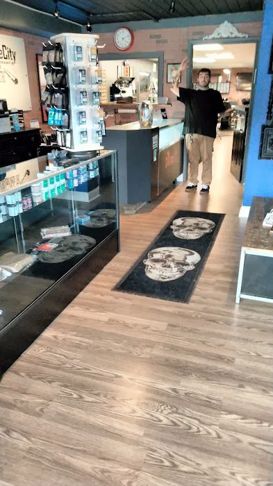 SmokeCity & tattoos New Owners CBD Delta8s an THCs former Voodoo tattoo 7