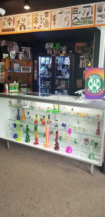 SmokeCity & tattoos New Owners CBD Delta8s an THCs former Voodoo tattoo 9
