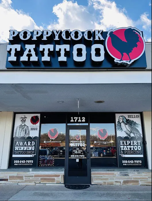 Poppycock Tattoo & Piercing 0