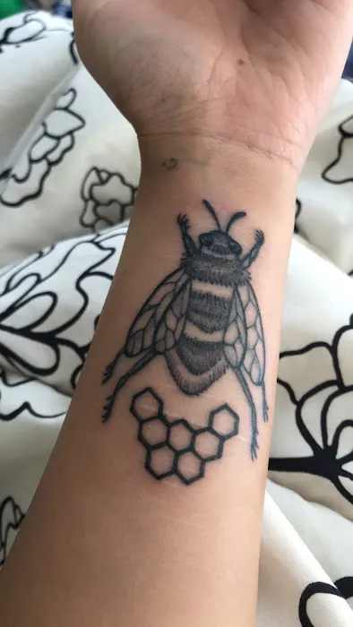 Poppycock Tattoo & Piercing 9