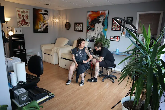 Kraken's Curse Tattoo Studio 0