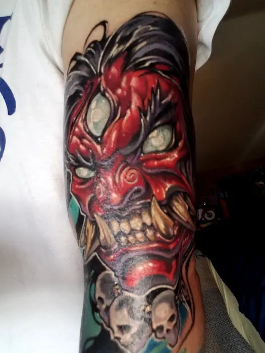 Evolution Tattoo Studio 9