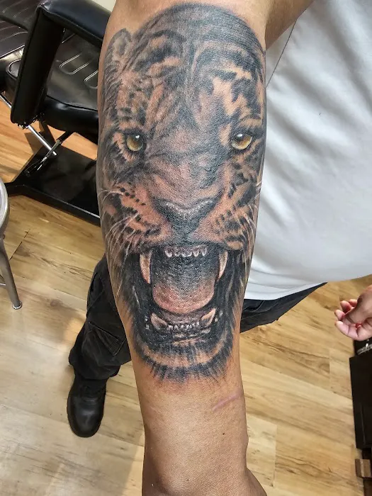Rayzor Tattoos 0