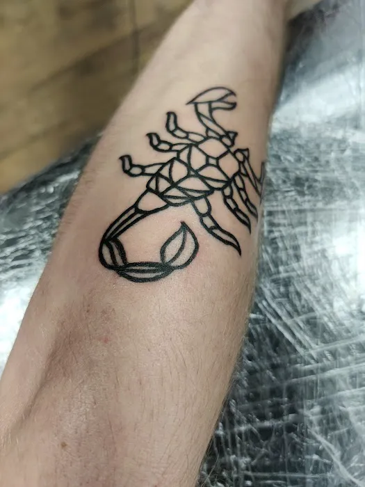 Gunzalez Ink Tattoo & Piercing Shop 0