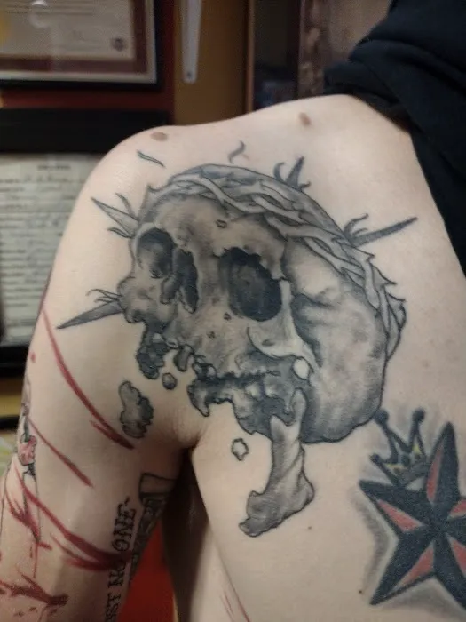 Cursed World tattoo and body piercing 7