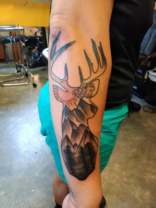 FTP Piercing/Wayne's Tattoo World 8