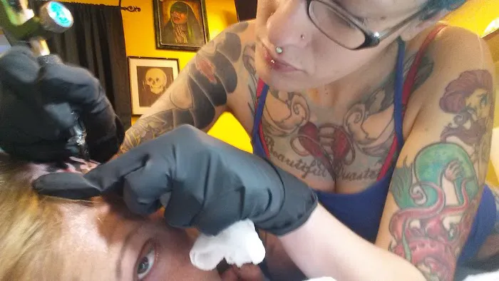 FTP Piercing/Wayne's Tattoo World 9