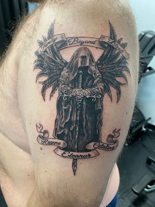 Gravitas Tattoo 9