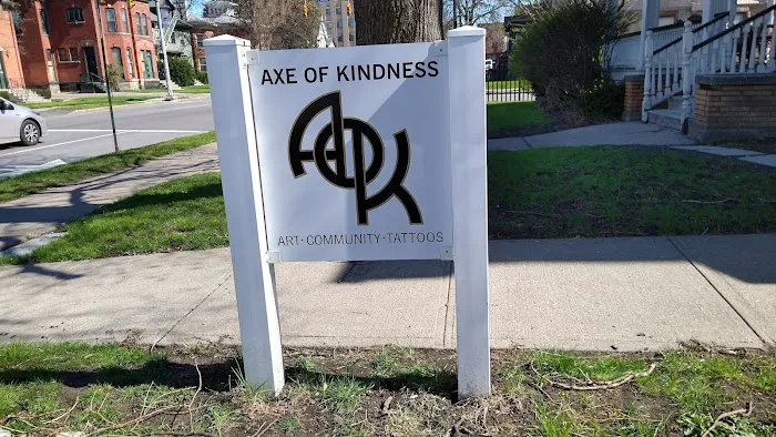 Axe of Kindness Tattoo 4