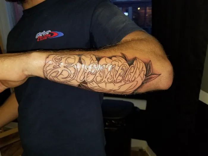 Uptown Ink Tattoo Parlor 8