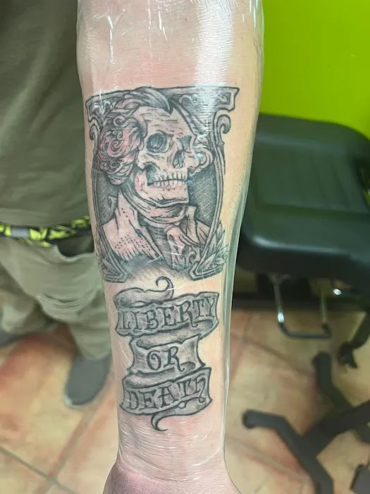 Rock & Roll Tattoo and Piercing Co. 1