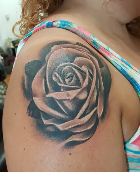Beautiful Sin Tattoos & Body Piercings 7